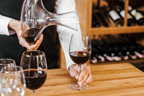 Cropped Shot Sommelier Pouring Wine Decanter Wine Store — Stock Photo, Image