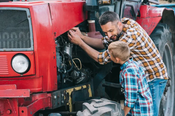 Happy Father Son Repairing Tractor Engine Together — Stock Photo, Image