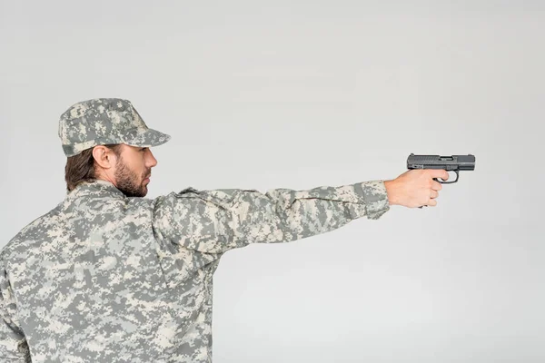 Side View Male Soldier Military Uniform Holding Gun Isolated Grey — Free Stock Photo