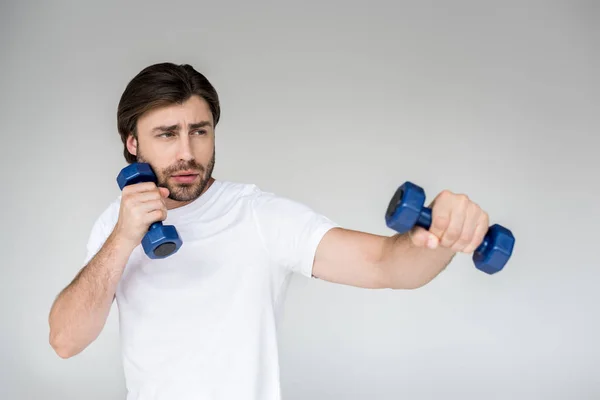 Portrait Man White Shirt Blue Dumbbells Hands Exercising Grey Backdrop — Stock Photo, Image