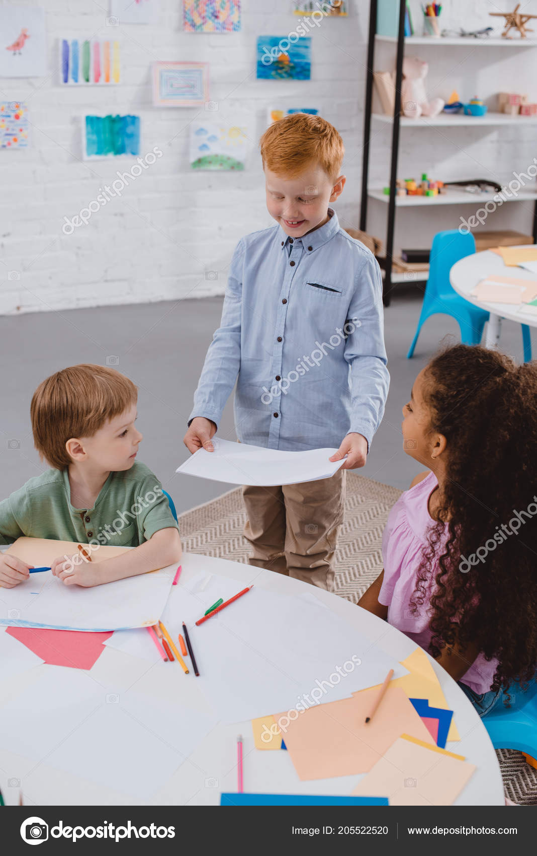 Multicultural Kids Drawing With Pencils In Kindergarten Free Stock