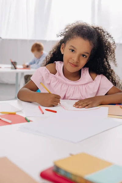 Selective Focus Smiling African American Kid Table Papers Pencils Drawing — Stock Photo, Image
