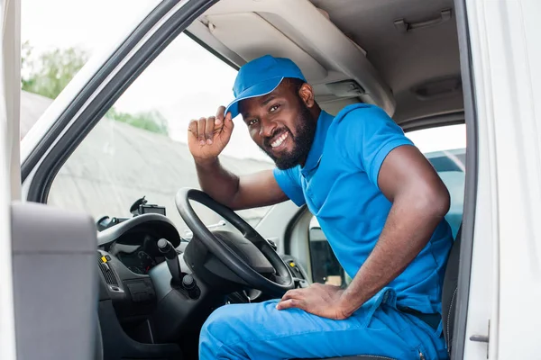 African American Delivery Man Greeting Touching Cap Car — Stock Photo, Image