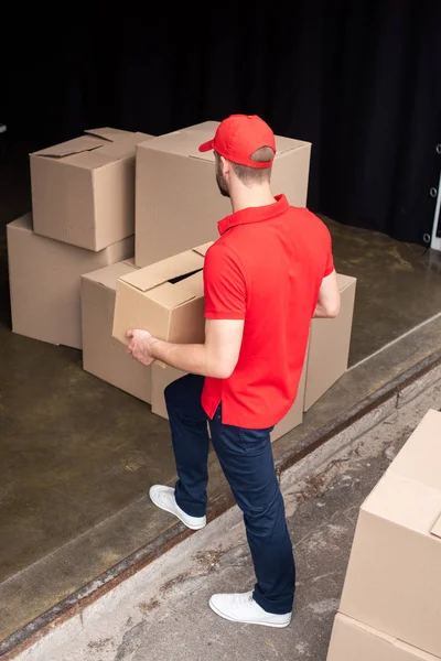 High Angel View Young Delivery Man Red Uniform Discharging Cargo — Stock Photo, Image