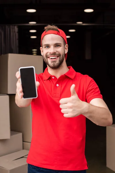 Portrait Cheerful Delivery Man Smartphone Showing Thumb — Stock Photo, Image