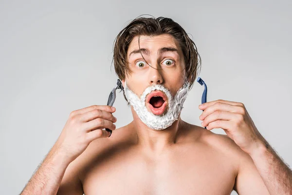 Portrait Shocked Man Shaving Foam Face Holding Razors Isolated Grey — Stock Photo, Image