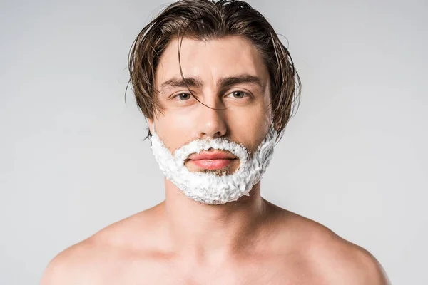 Portrait Young Man Shaving Foam Face Looking Camera Isolated Grey — Stock Photo, Image