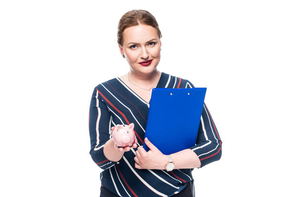smiling female accountant with clipboard showing pink piggy bank isolated on white background