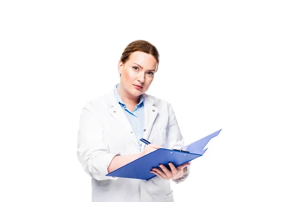 Serious Female Doctor White Coat Writing Clipboard Isolated White Background — Free Stock Photo