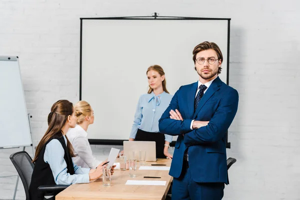 Handsome Young Businessman Crossed Arms Looking Camera Modern Office Female — Stock Photo, Image