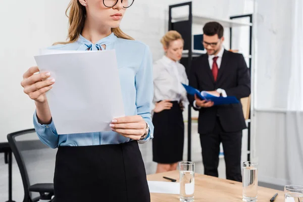 Cropped Shot Young Businesswoman Documents Standing Modern Office Colleagues Background — Stock Photo, Image