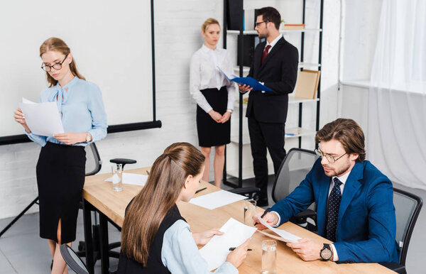  team of business partners working together at modern office