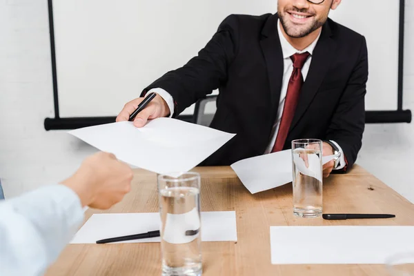 Cropped Shot Businessman Passing Blank Papers Female Colleague Office — Stock Photo, Image