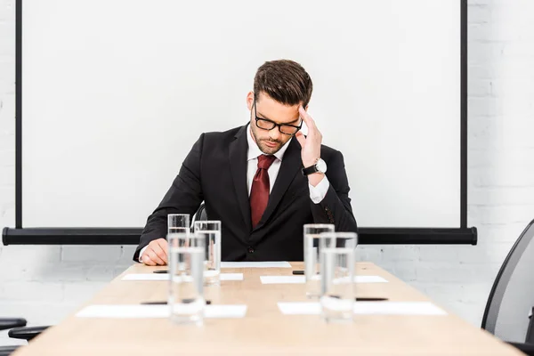 Thoughtful Young Businessman Working Alone Conference Hall — Stock Photo, Image
