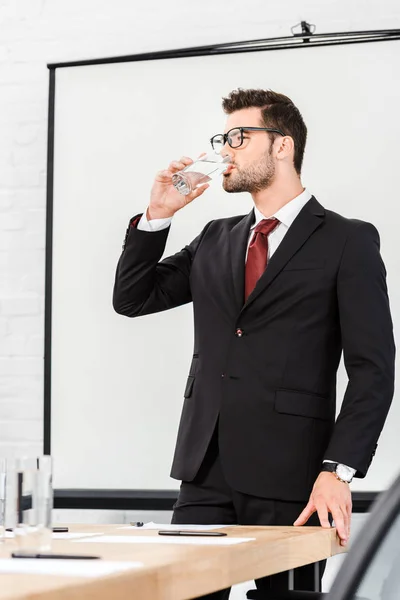 Attractive Young Businessman Drinking Water Modern Office — Stock Photo, Image