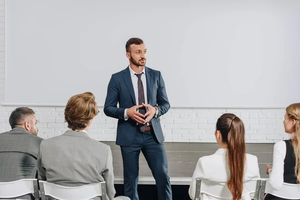 Pensive Business Trainer Looking Away Hub — Stock Photo, Image