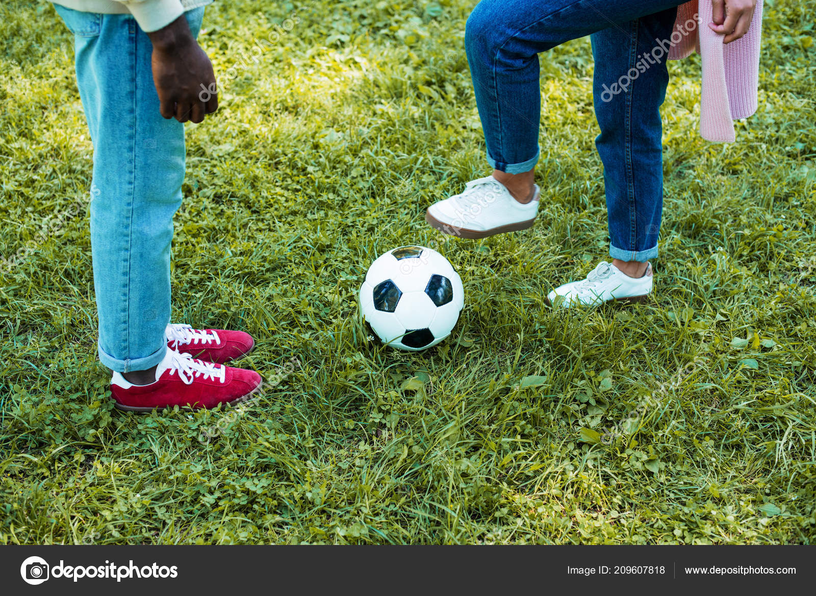Cropped Image African American Couple Playing Football Park Stock Photo by  ©IgorVetushko 209607818