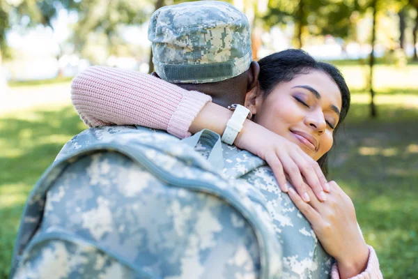 African American Soldier Military Uniform Hugging Happy Girlfriend Park — Stock Photo, Image