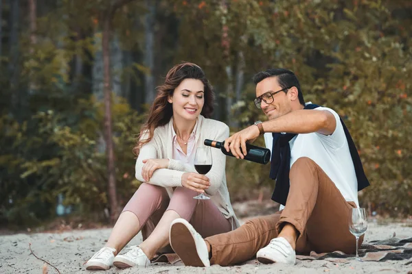 Man Pouring Red Wine Glass While Resting Together Wife Sandy — Stock Photo, Image