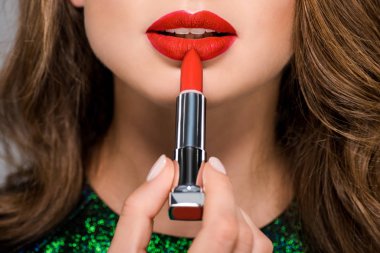 cropped shot of woman with red lipstick isolated on grey clipart