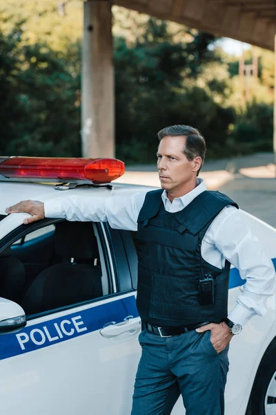 Middle Aged Policeman Bulletproof Vest Standing Car City Street — Stock Photo, Image
