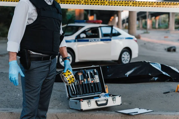 Partial View Policeman Latex Gloves Holding Police Line Crime Scene — Stock Photo, Image