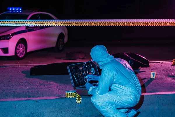 Rear View Male Criminologist Protective Suit Latex Gloves Collecting Evidence — Stock Photo, Image