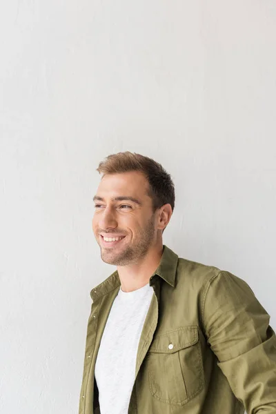 Smiling Man Looking Away White Wall — Stock Photo, Image
