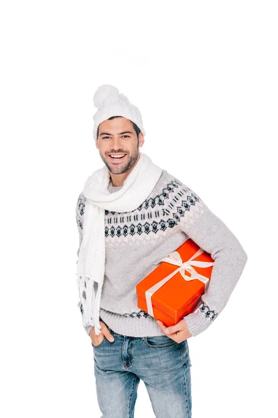 Handsome Young Man Sweater Scarf Hat Holding Gift Box Smiling — Stock Photo, Image