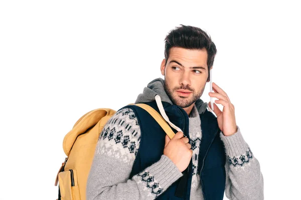 Handsome Young Man Backpack Talking Smartphone Looking Away Isolated White — Stock Photo, Image