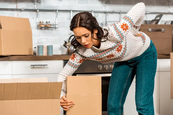 Young Woman Having Pain Back While Carrying Cardboard Boxes Relocation — Stock Photo, Image
