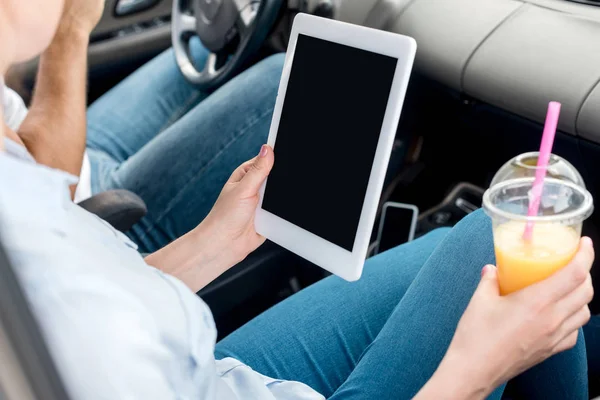 Cropped Shot Woman Plastic Cup Orange Juice Using Tablet Car — Free Stock Photo