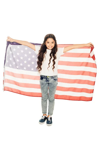 幸せな愛らしい子アメリカ国旗を押しながら白で隔離カメラ目線  — 無料ストックフォト