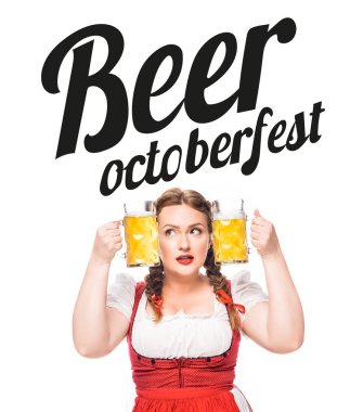 oktoberfest waitress in traditional bavarian dress putting head between mugs of light beer isolated on white background with 