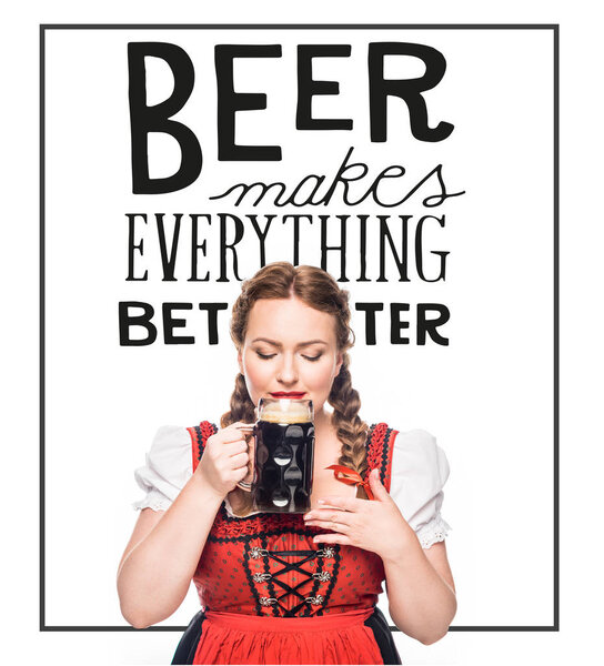 oktoberfest waitress in traditional bavarian dress drinking dark beer isolated on white background with "beer makes everything better" inspiration