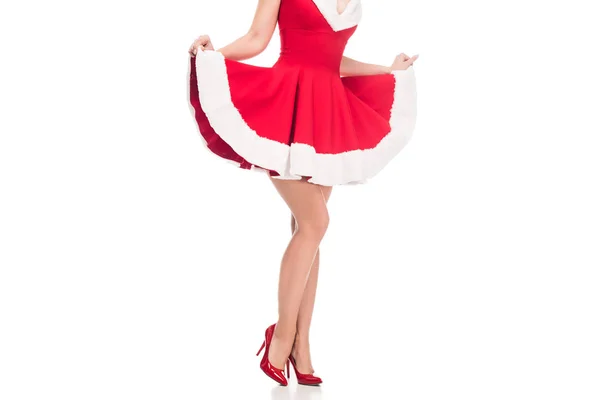 クリスマス ドレス白で隔離を上げるハイヒールでセクシーなサンタ少女のトリミングされた画像 — ストック写真