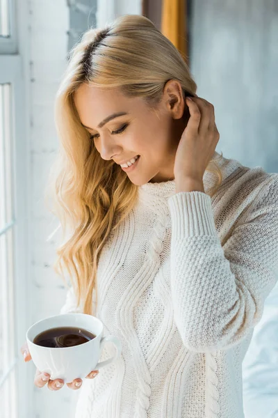 Smiling Attractive Woman Sweater Holding Cup Coffee Bedroom Morning — Stock Photo, Image