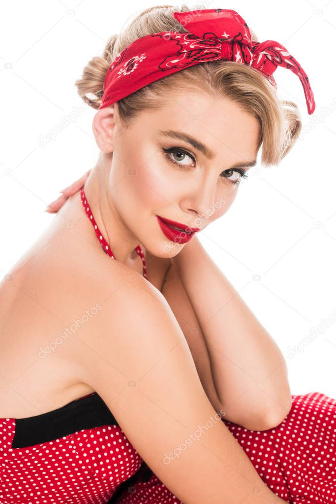 stylish pin up woman with red lips looking at camera isolated on white