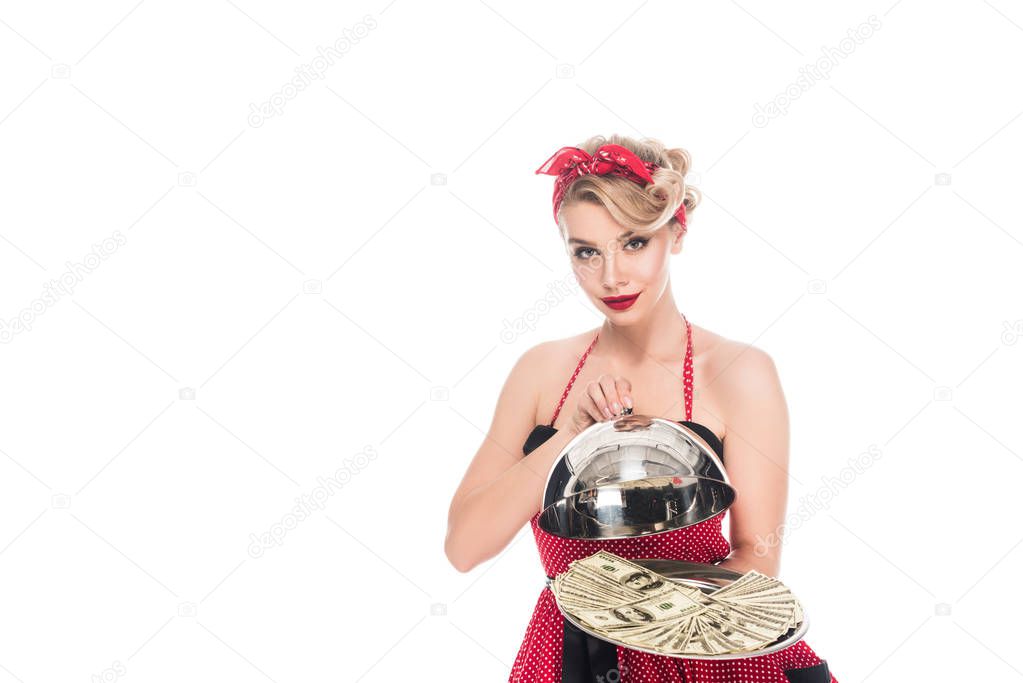 portrait of beautiful pin up woman with dollar banknotes on serving tray isolated on white