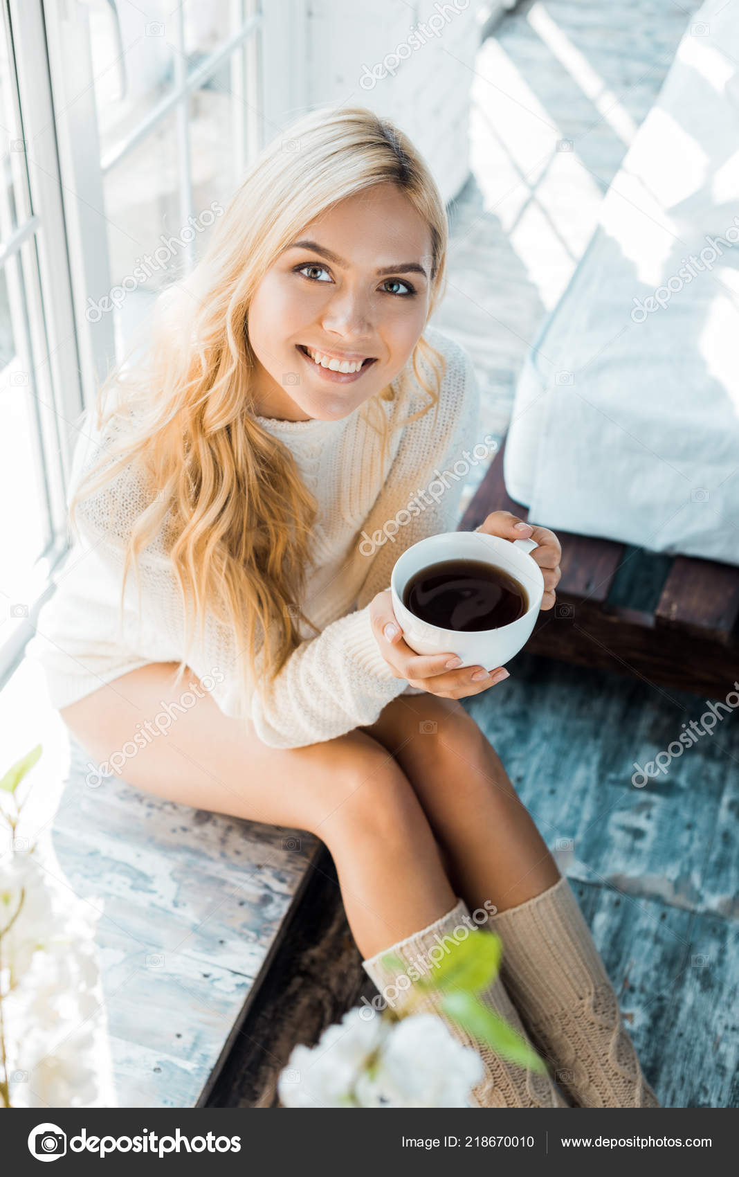 High Angle View Smiling Attractive Woman Sweater Holding Cup Coffee Stock  Photo by ©IgorVetushko 218670010