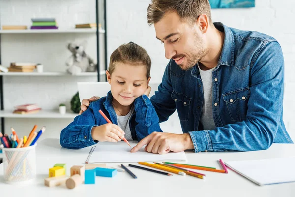 Handsome Young Father Drawing Son Home — Stock Photo, Image