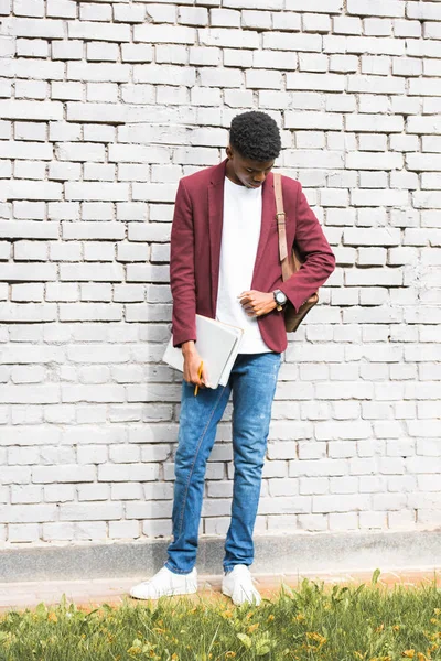 Stylish African American Freelancer Documents Leather Backpack Standing White Brick — Free Stock Photo