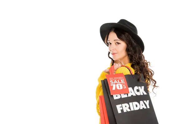 有吸引力的时尚购物狂持有购物袋黑色星期五出售 查出白色 — 图库照片