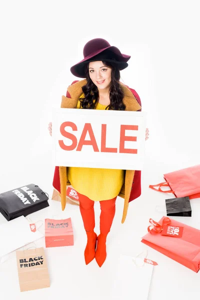 Beautiful Girl Holding Sale Sign Posing Shopping Bags Black Friday — Free Stock Photo