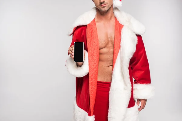 Beskuren Bild Sexig Man Santa Dräkt Holding Smartphone Med Blank — Stockfoto
