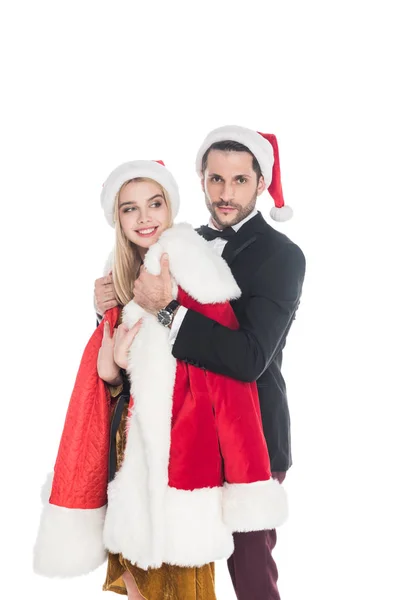 Giovane Uomo Mettendo Costume Babbo Natale Sulla Ragazza Isolata Sul — Foto stock gratuita