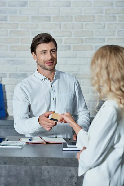 Cropped Shot Buyer Giving Credit Card Smiling Salesman Store — Stock Photo, Image