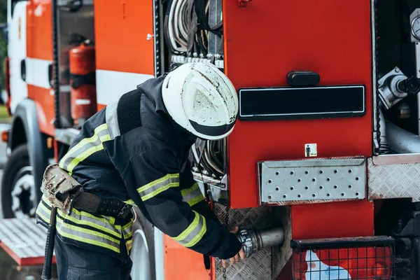 Partial View Firefighter Protective Uniform Checking Water Hose — Stock Photo, Image