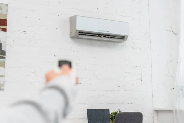 Cropped Shot Woman Pointing Air Conditioner Remote Control — Stock Photo, Image