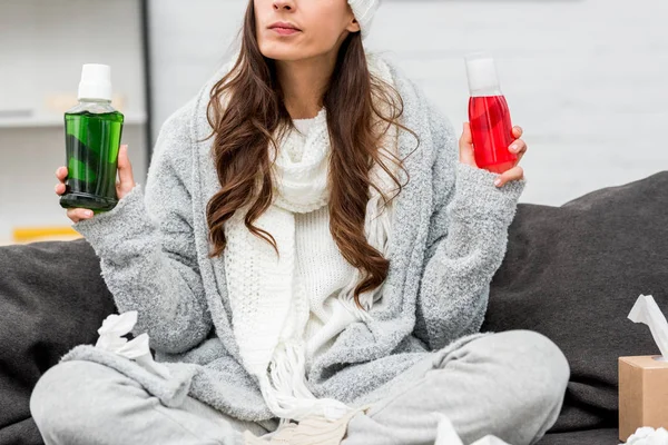 Cropped Shot Sick Young Woman Warm Clothes Choosing Red Green — Free Stock Photo